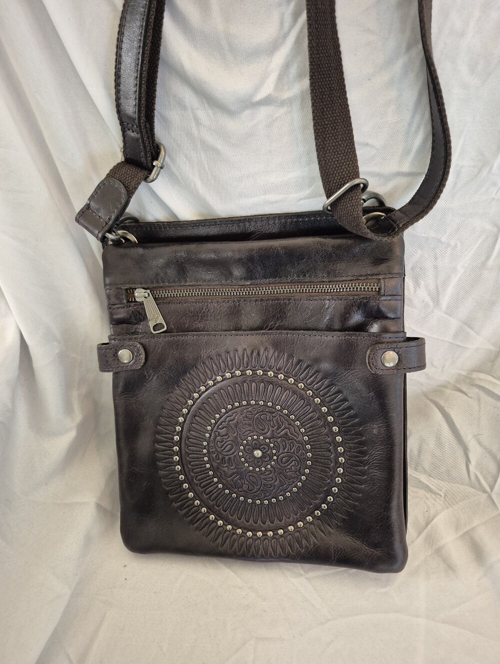 Patricia Nash Black Embossed Leather Crossbody Bag with Stud Detail.